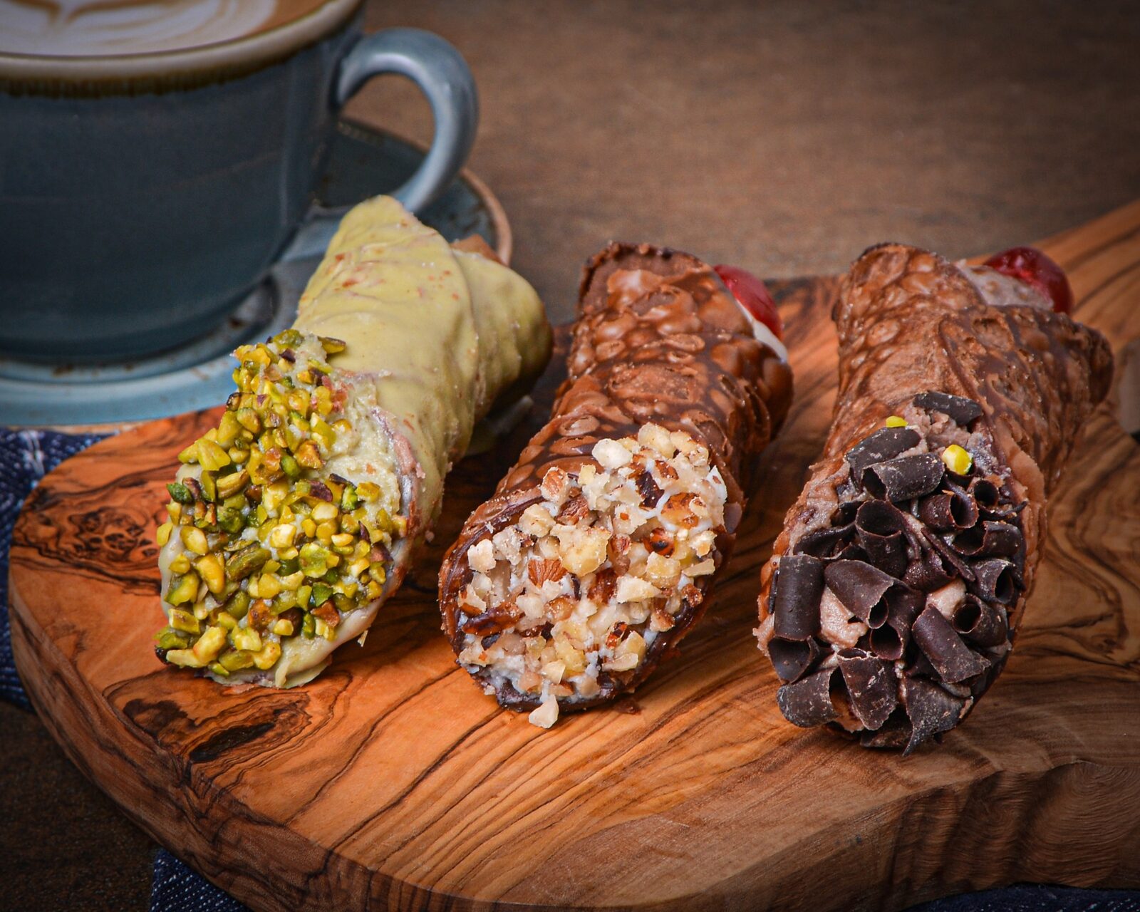Pistachio, hazelnut and chocolate cannoli served with coffee at Smolenski’s